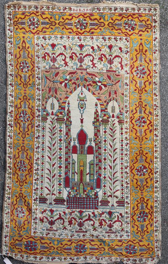 A Persian prayer rug, 6ft 6in by 4ft 2in.
